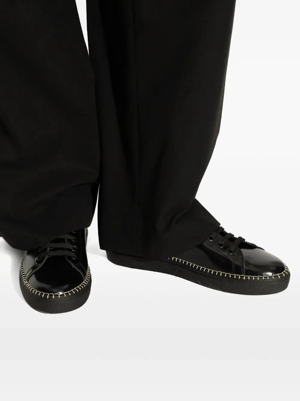 Moschino Logo-Embossed Trainers Grazuv Mart