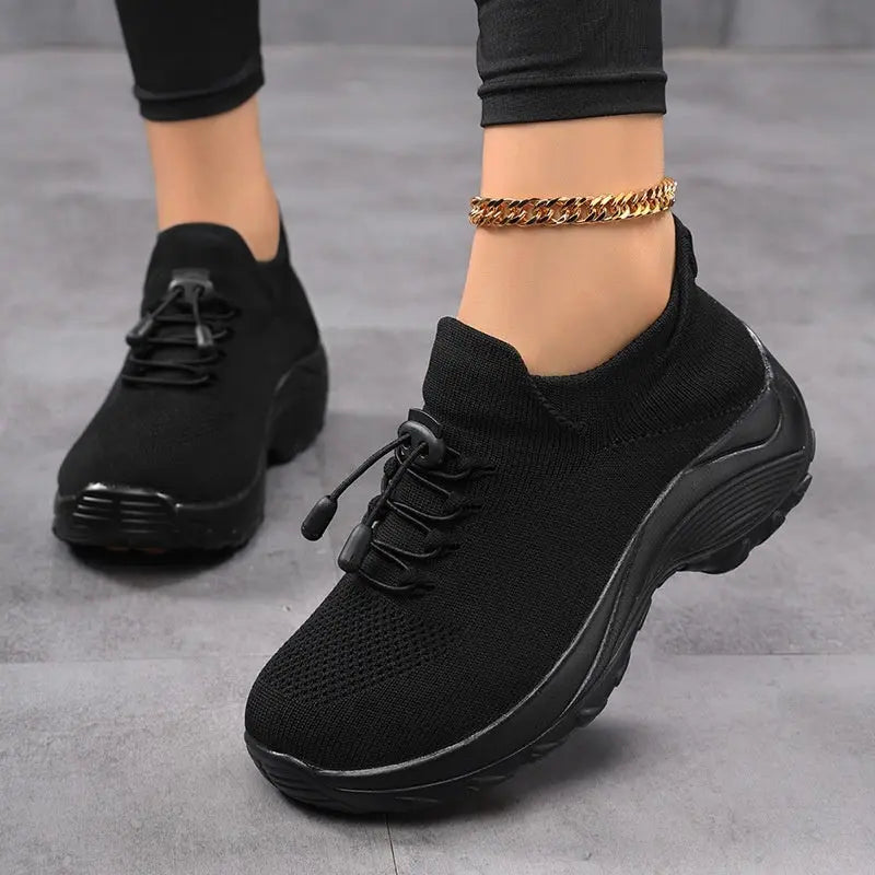Casual Women's Flyknit Shoes With A Round Toe.